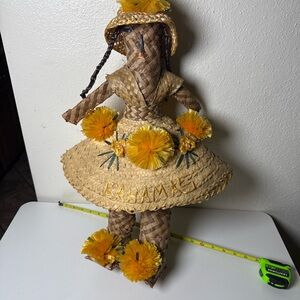 Handcrafted Straw Doll with Yellow Accents